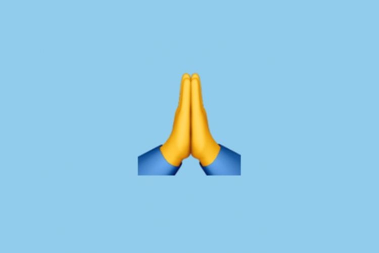 Arti emoji tangan menyatu ini diperdebatkan, minta maaf atau tos?